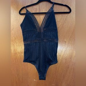 Black bodysuit with sheer areas size small
